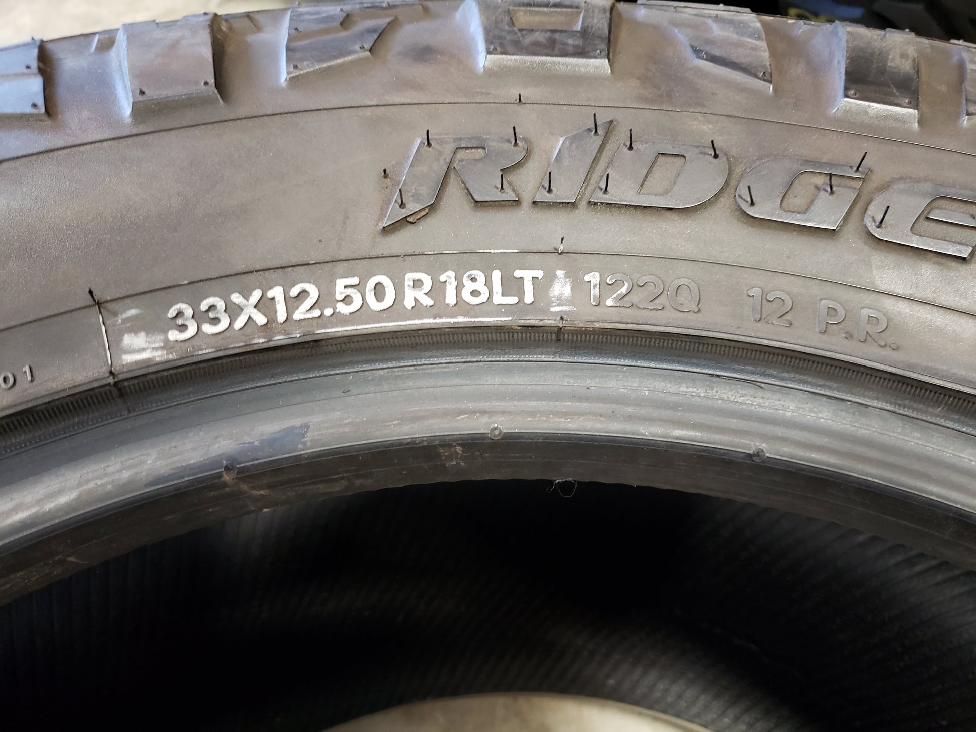 SINGLE 33X12.50R18 Nitto RIDGE GRAPPLER 112 Q F - Used Tires